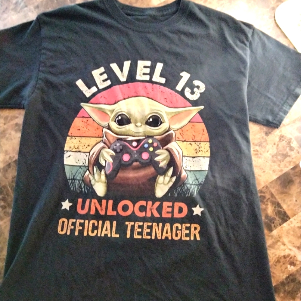 Baby Yoda mandalorian leveling up to 13 years old unique t-shirt. Good condition
